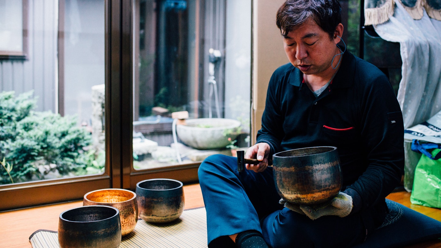 Yoshinori San, 4th generation master, and one of ten remaining craftsmen in entire Japan capable of making Buddhist Rin bells. 