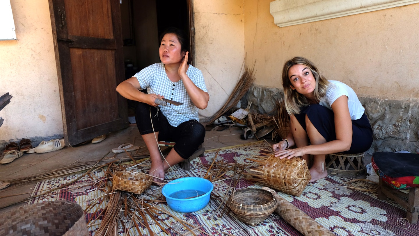 Elena Vela Rey learning how to make baskets.