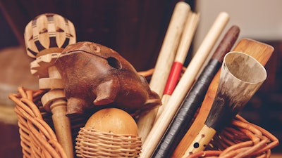 Basket of wooden instruments