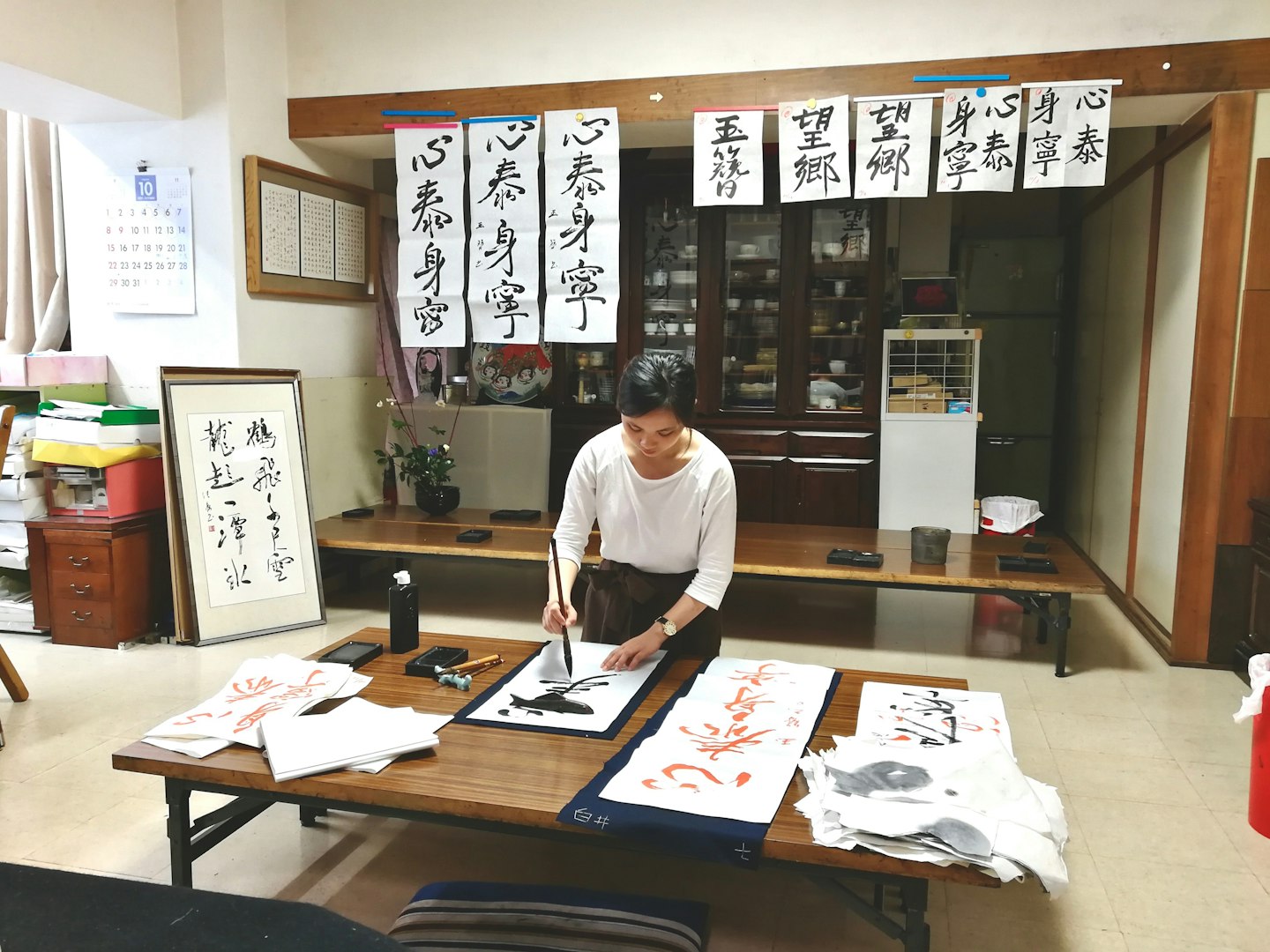 You can seek out creativity in a calligraphy studio in Japan or your own backyard. Courtesy of Kate Tram Nguyen.