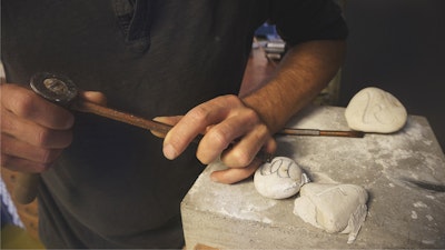 Practice carving and letterpress techniques.