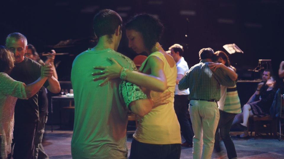 Practice dancing tango in milongas in the city.