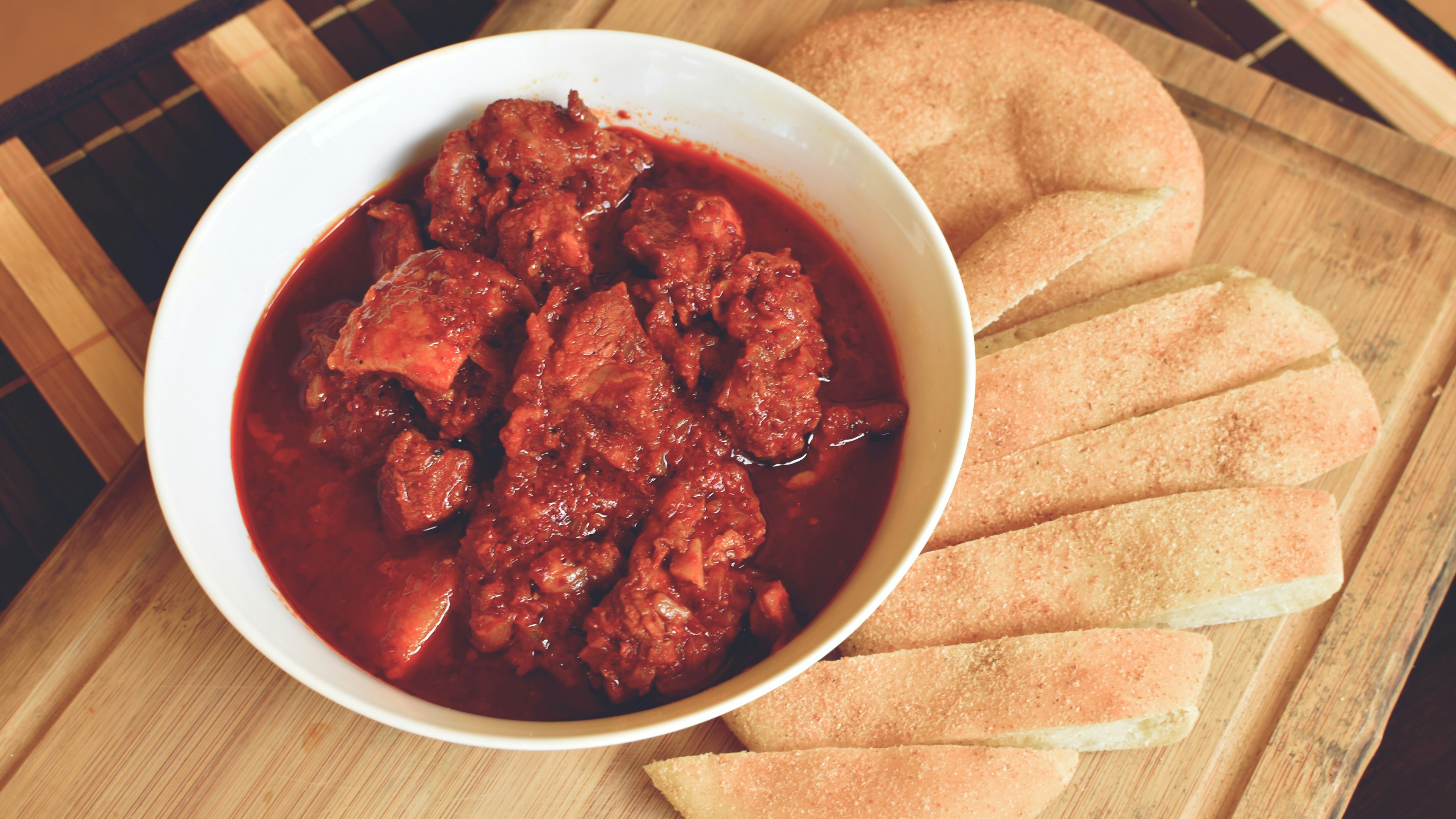 Preparing Portuguese-style dishes like East Indian vindaloo