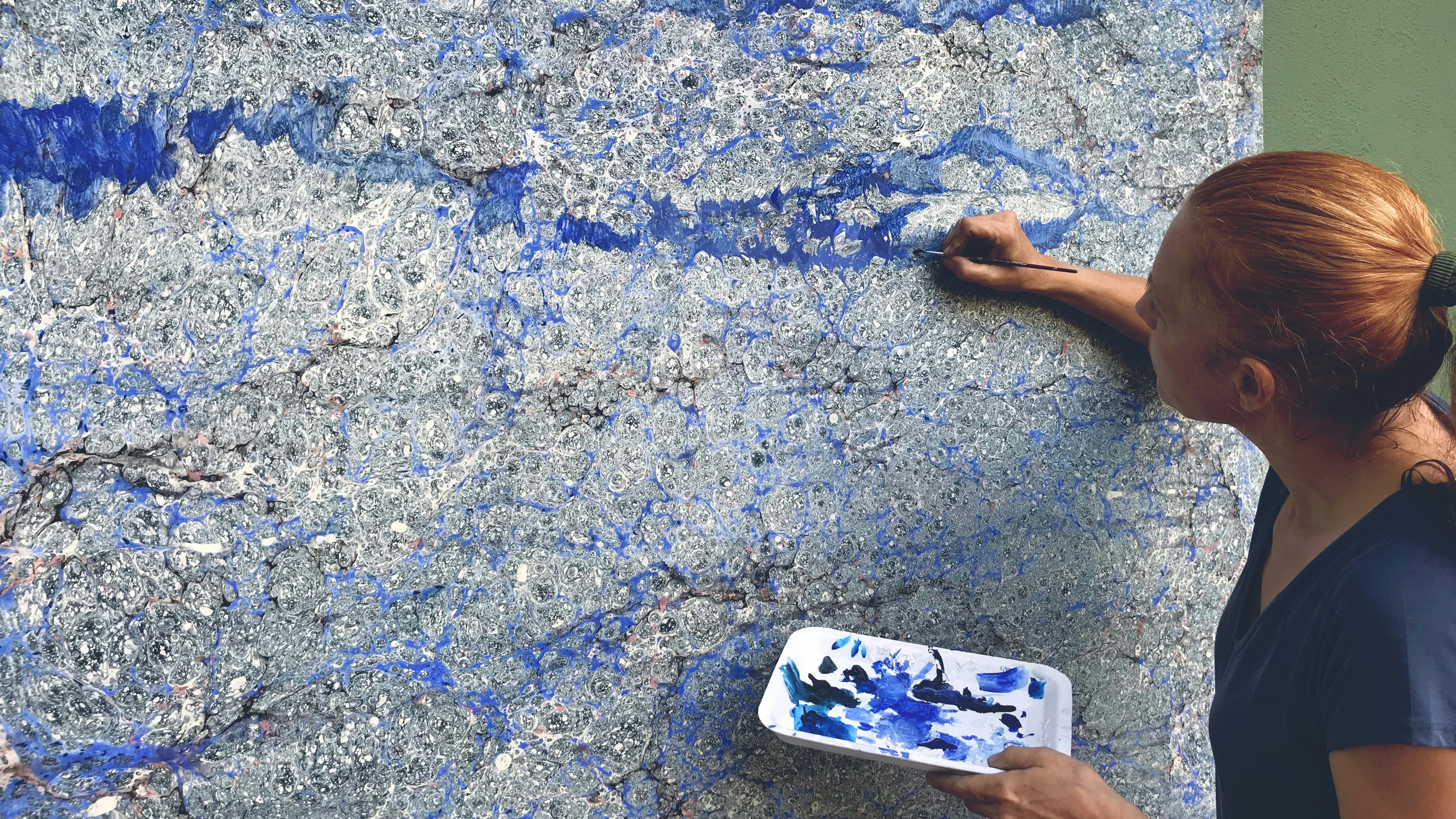 Final touch ups by hand.