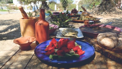 Enjoy Greek home-cooked dinner while learning its history.