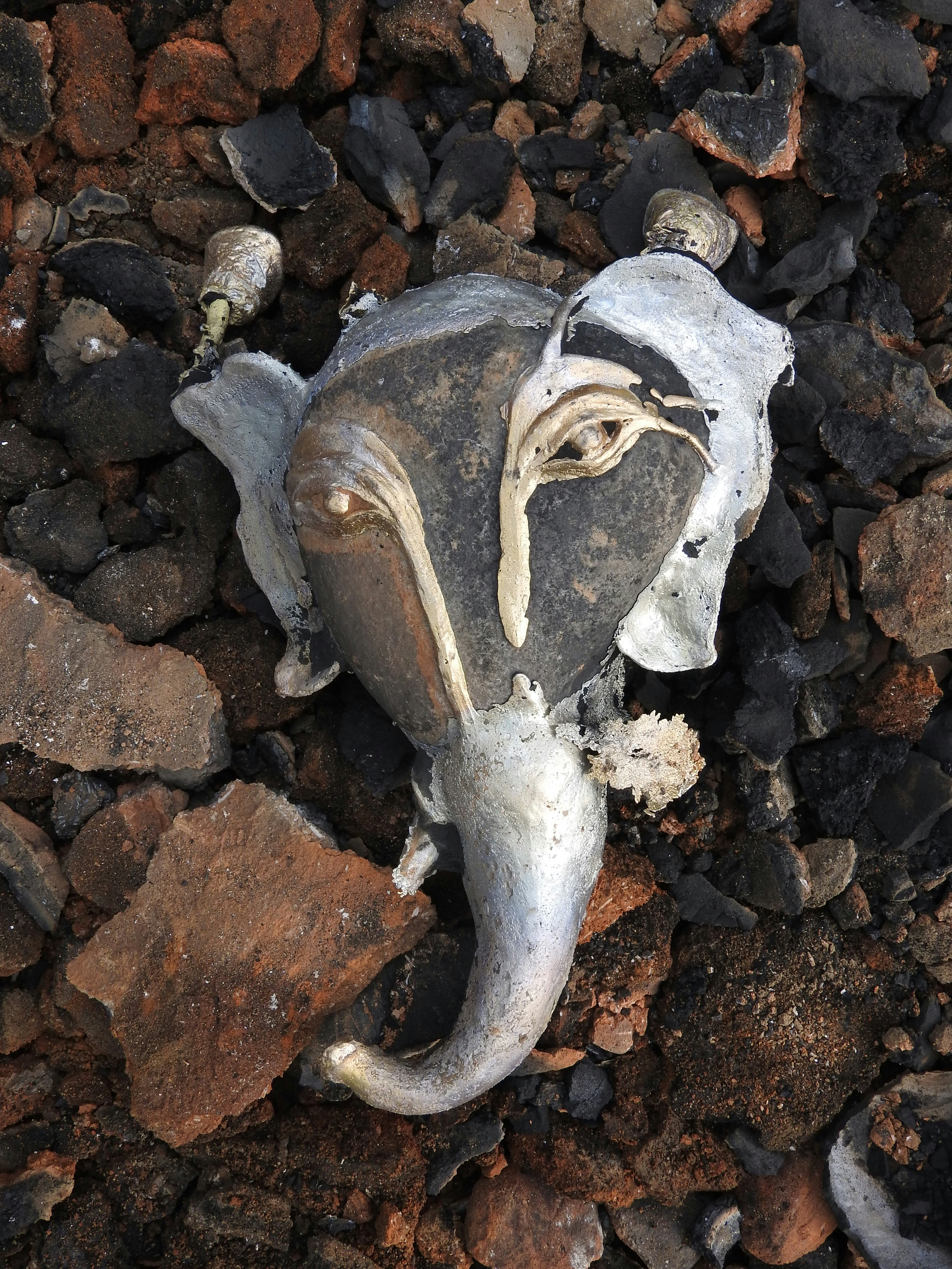 Creating the ear on a large head of Ganesh, based on a river stone for the skull.