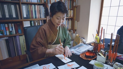 Impeccable body posture is integral in the practice of calligraphy.