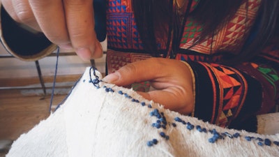 Learn natural fabric dyeing techniques and embroidery from Vietnam's leading textile designer. #creativevacation #vawaa  #travelasia #vietnam #creativity #sustainablefashion #naturalfabricdyeing #naturalfabricdyeingtechniques #slowtravel #naturalfabricdyeingideas #diyfabrics #crafts #howtomake #indigo