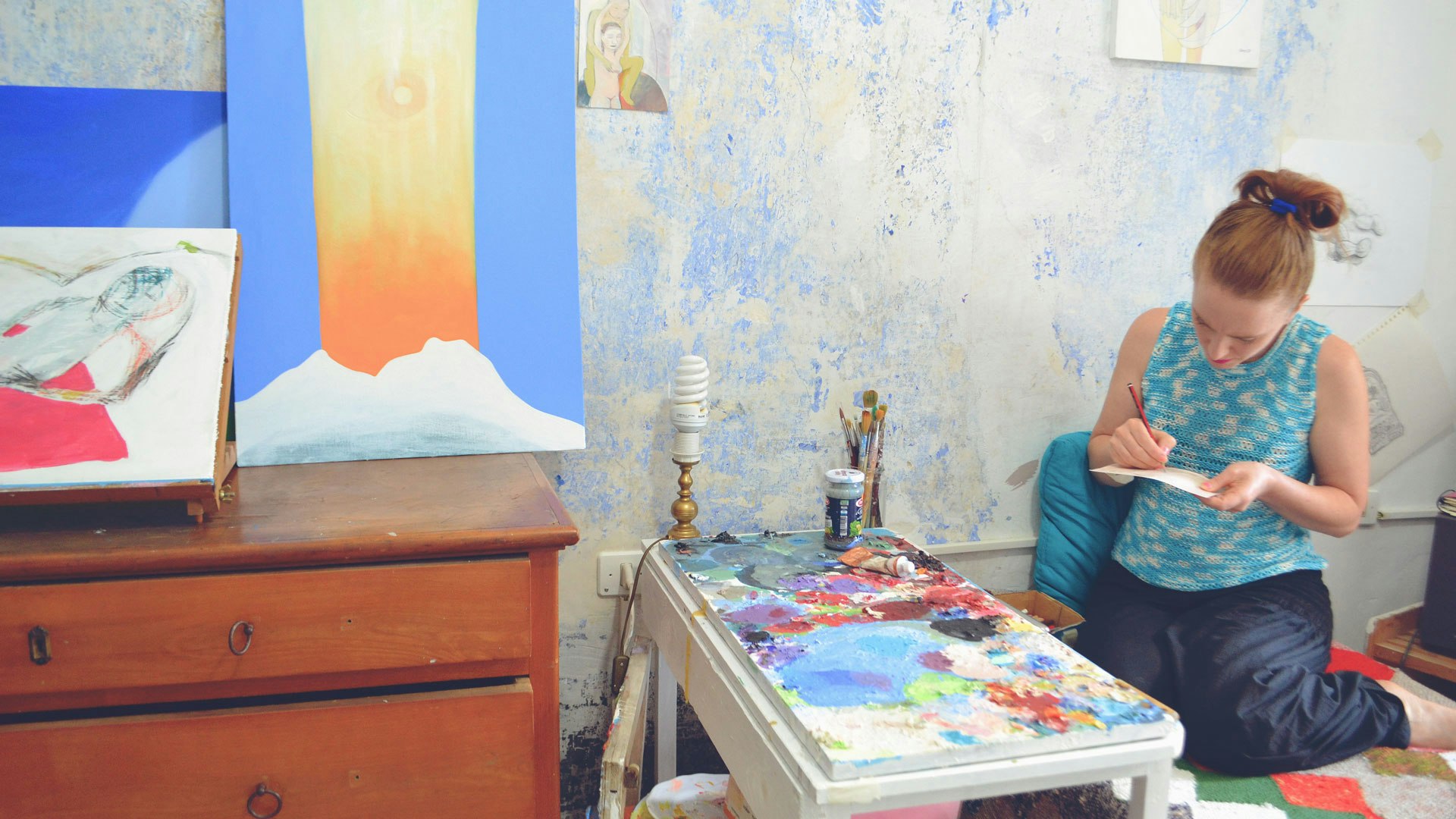 Clare at work, experimenting with colors...