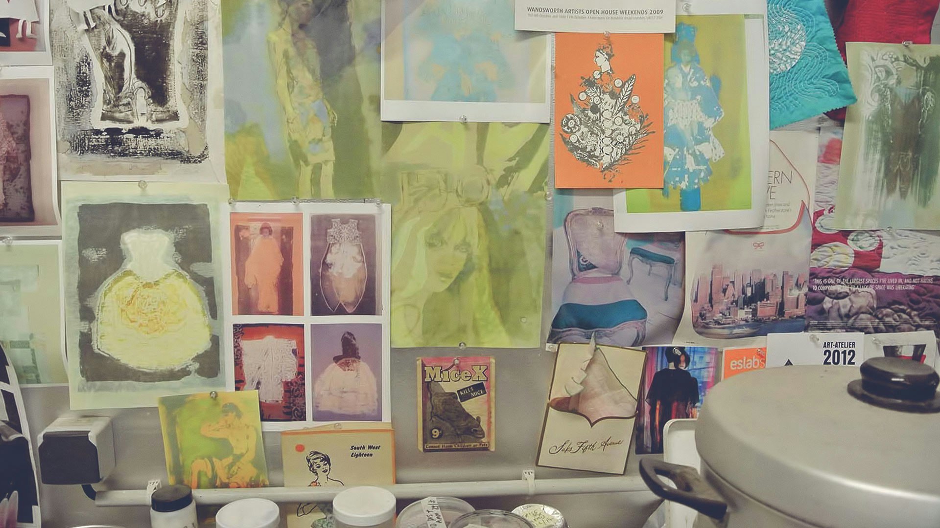 Colorful paintings and prints.