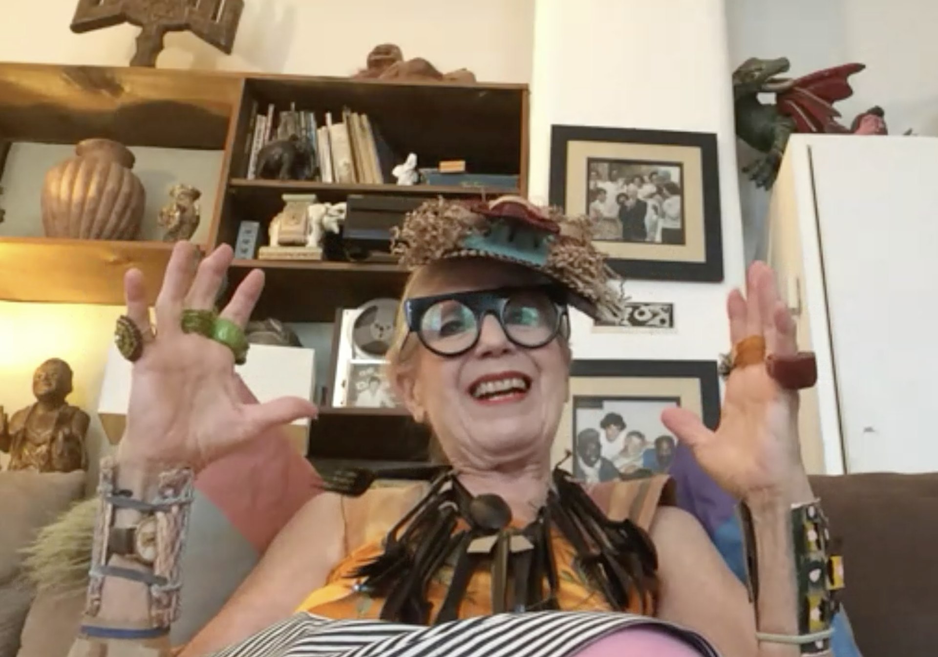 A screenshot of Debra from our conversation on Zoom, wearing her designs.