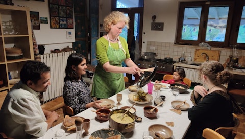 VAWAA artist Ursula and guest Sonam's family enjoy an art education in historical cuisine.